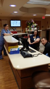 This looks like it could be trouble, Brice, Brittney,  and Melinda standing at the counter.
