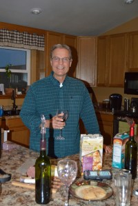 My brotherLee Dejmal home from work pouring some of his and Gails home made Wine for us.
