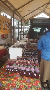 Rows of fireweed jelly and multiple diffent kinds of berry jams